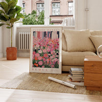 a living room with a couch and a painting on the wall