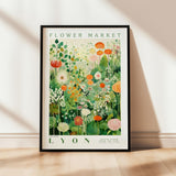 a flower market poster hanging on a wall