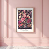 a pink room with a pink wall and a floral print on the wall