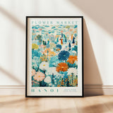 a flower market poster hanging on a wall