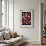 a living room with a couch and a painting on the wall
