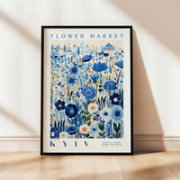 a flower market poster hanging on a wall