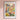 a flower market poster hangs on a wall