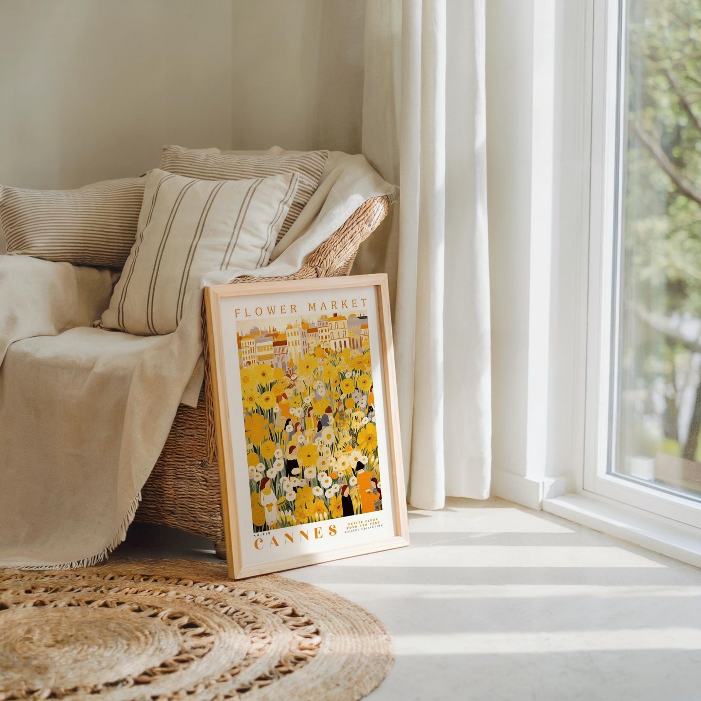a picture frame sitting on the floor in front of a window