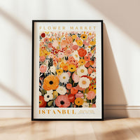 a flower market poster hanging on a wall