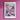 a poster of flowers on a pink wall