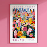 a pink wall with a flower market poster on it