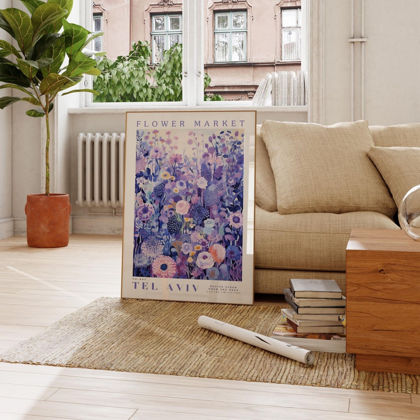 a living room with a couch and a poster on the floor