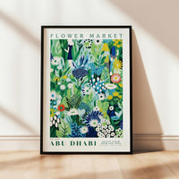 a flower market poster hanging on a wall