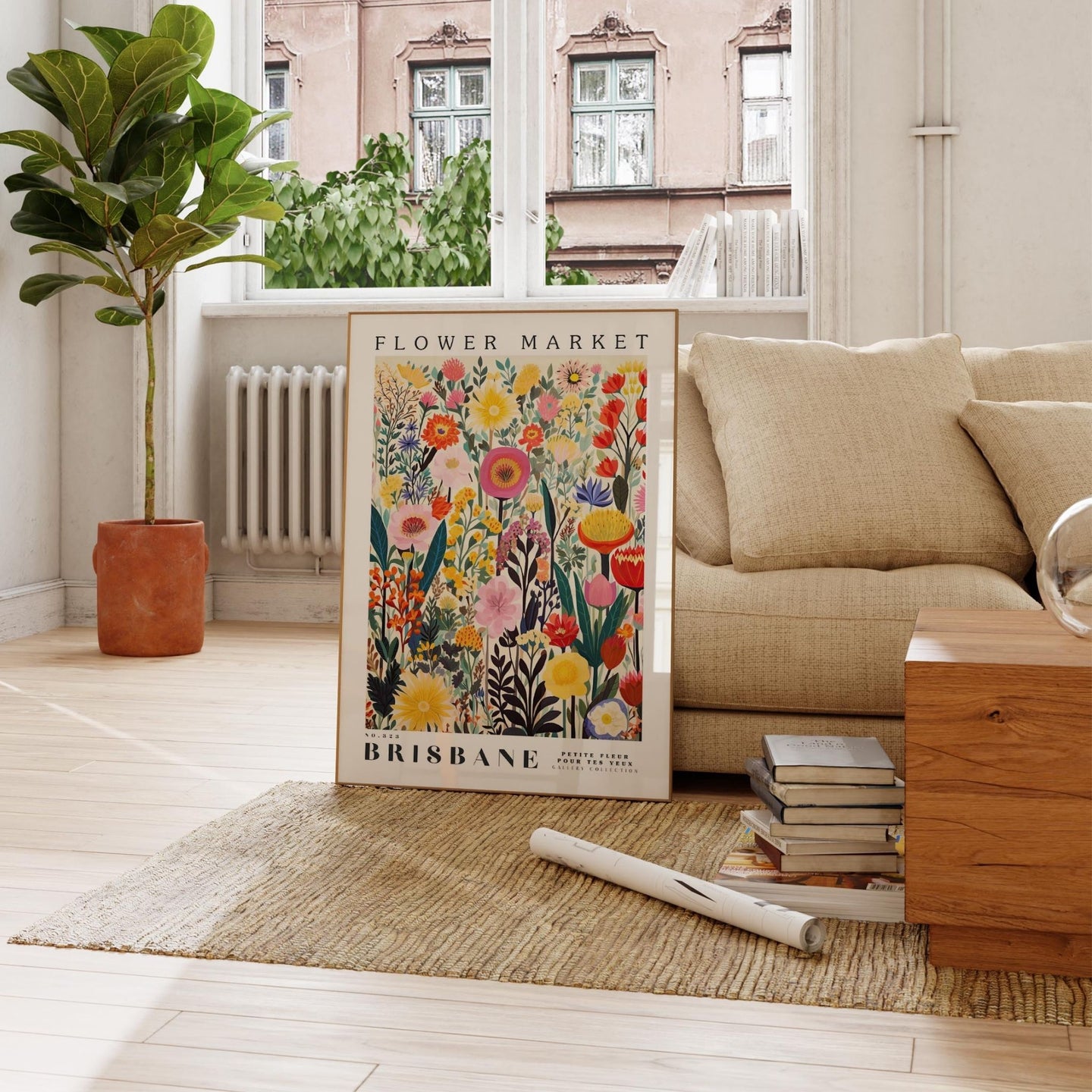 a living room with a flower market poster on the floor