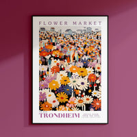 a flower market poster hanging on a wall