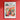 a flower market poster hangs on a red wall