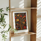 a picture of a tree on a shelf