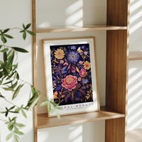 a picture of a painting of flowers on a shelf