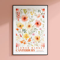 a flower market poster hanging on a wall