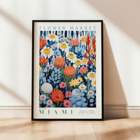 a picture of a flower market poster hanging on a wall
