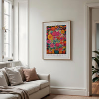 a living room with a couch and a painting on the wall