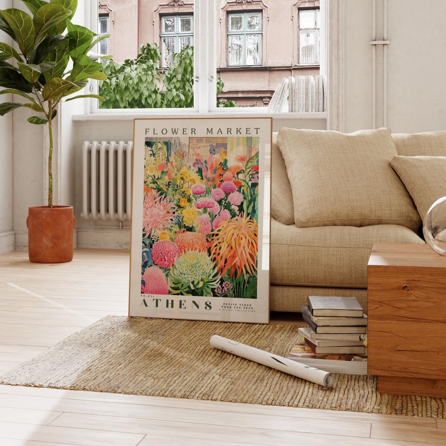 a living room with a couch and a poster on the floor