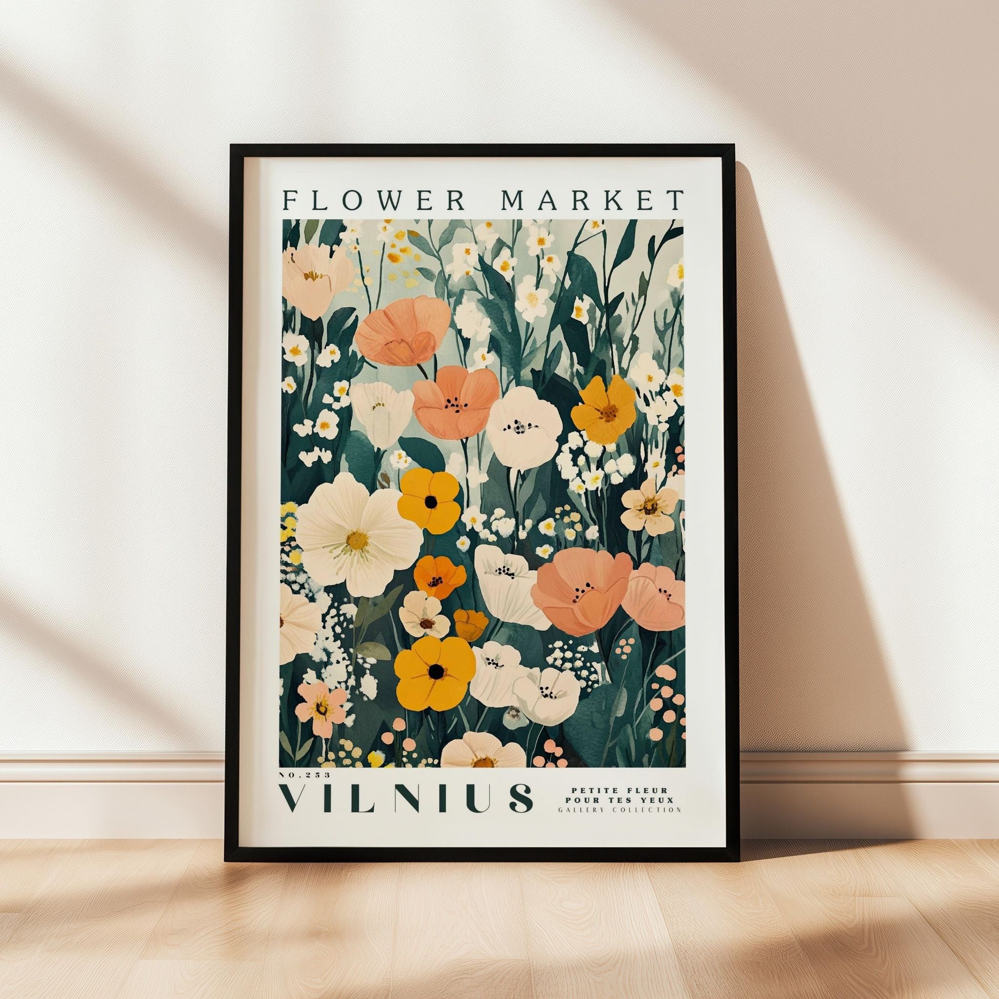 a picture of a flower market poster hanging on a wall