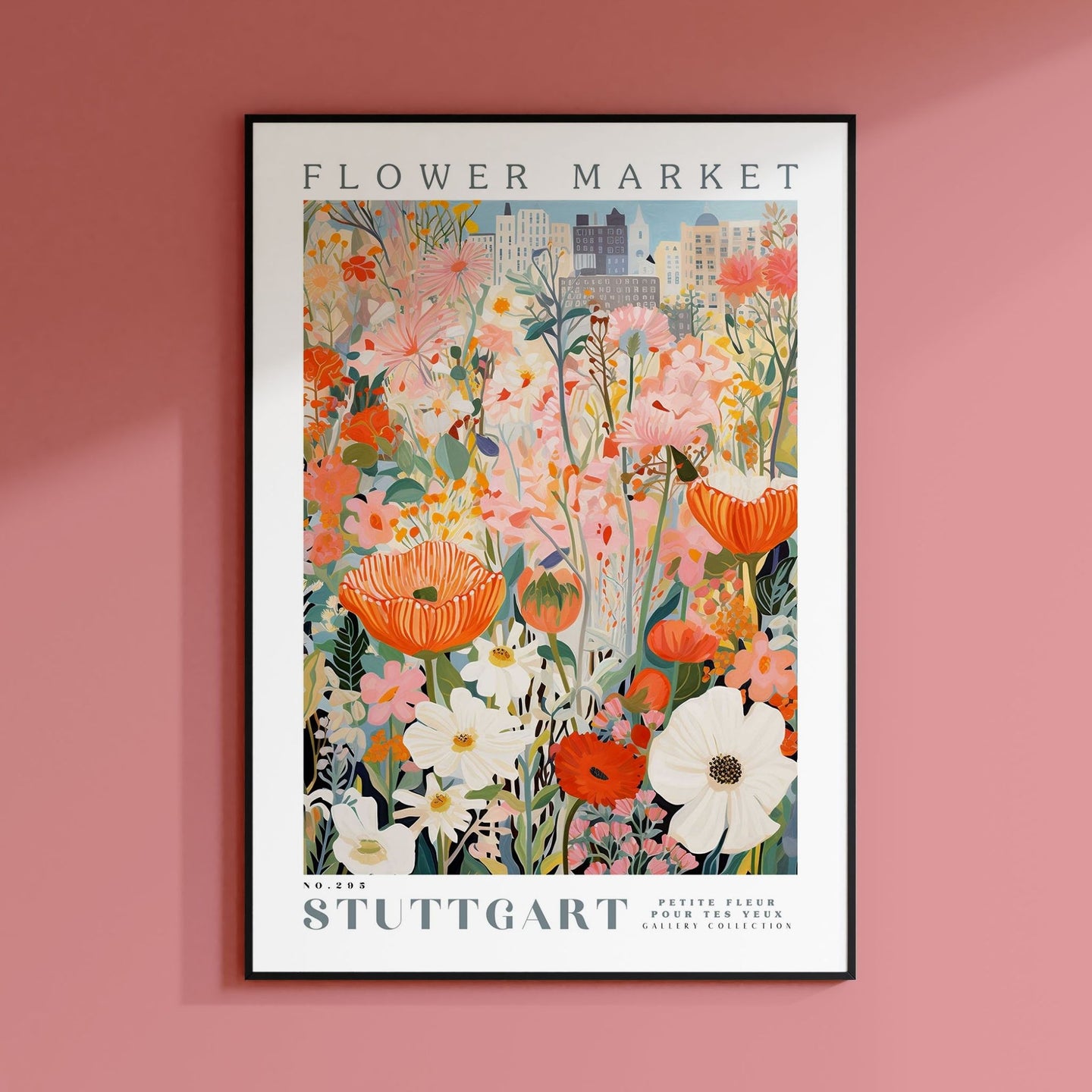 a pink wall with a picture of flowers on it