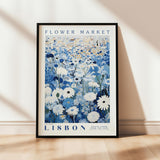 a picture of a flower market poster hanging on a wall