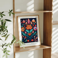 a picture of a floral design on a shelf
