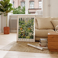 a living room with a couch and a poster
