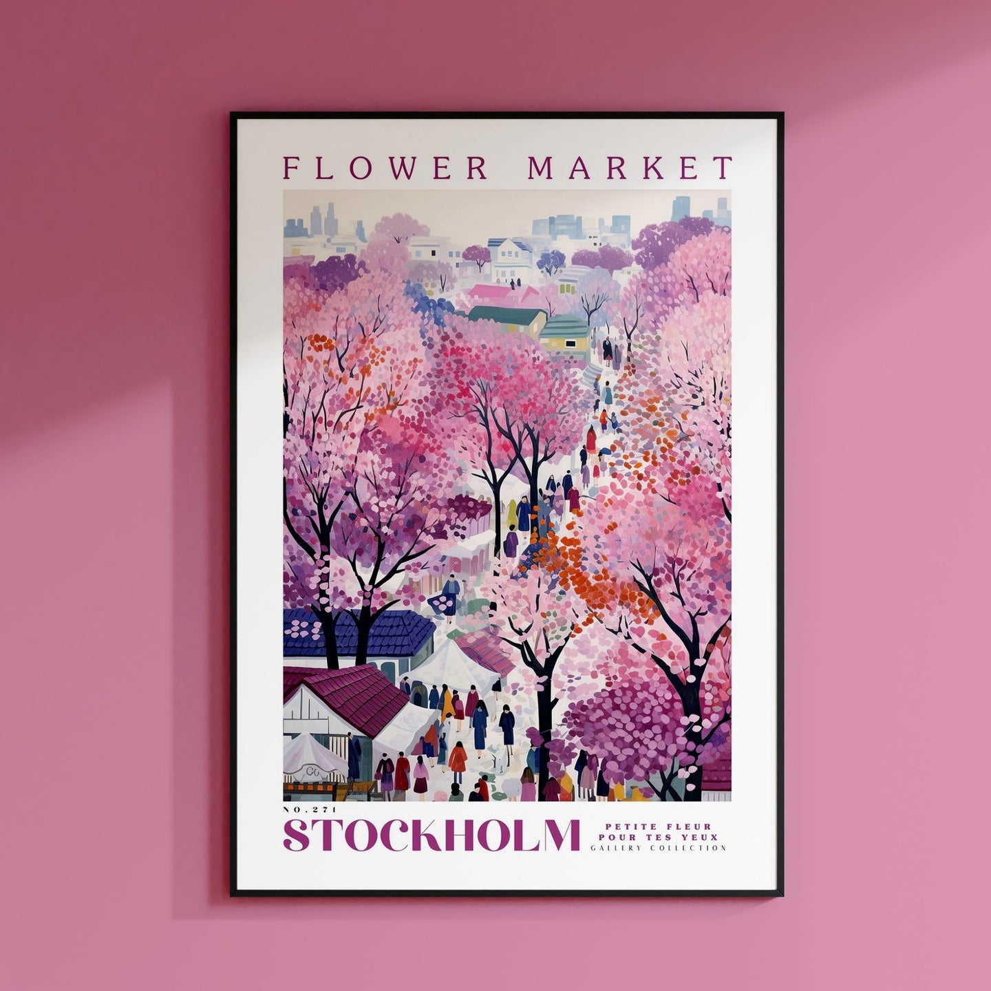a pink wall with a poster on it