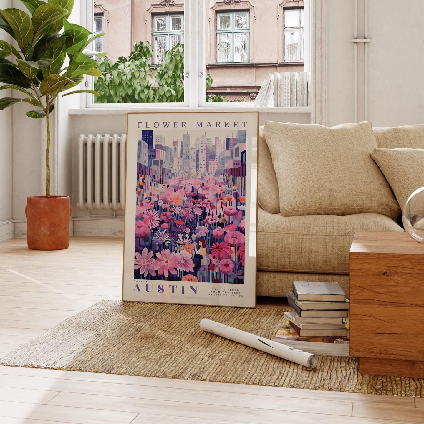 a living room with a couch and a poster on the floor