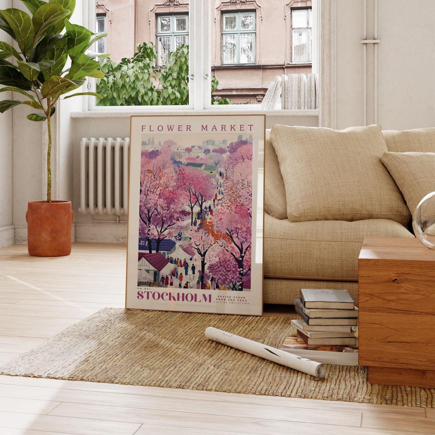 a living room with a couch and a poster on the floor