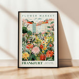 a picture of a flower market in france
