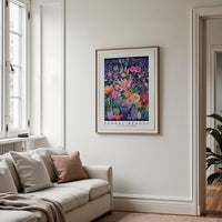 a living room with a couch and a painting on the wall