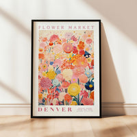 a flower market poster hanging on a wall