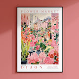 a flower market poster hangs on a pink wall