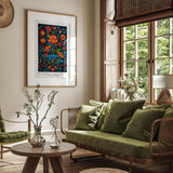 a living room filled with furniture and a painting on the wall