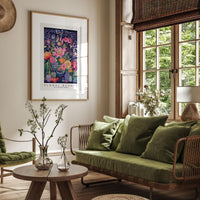 a living room filled with furniture and a painting on the wall