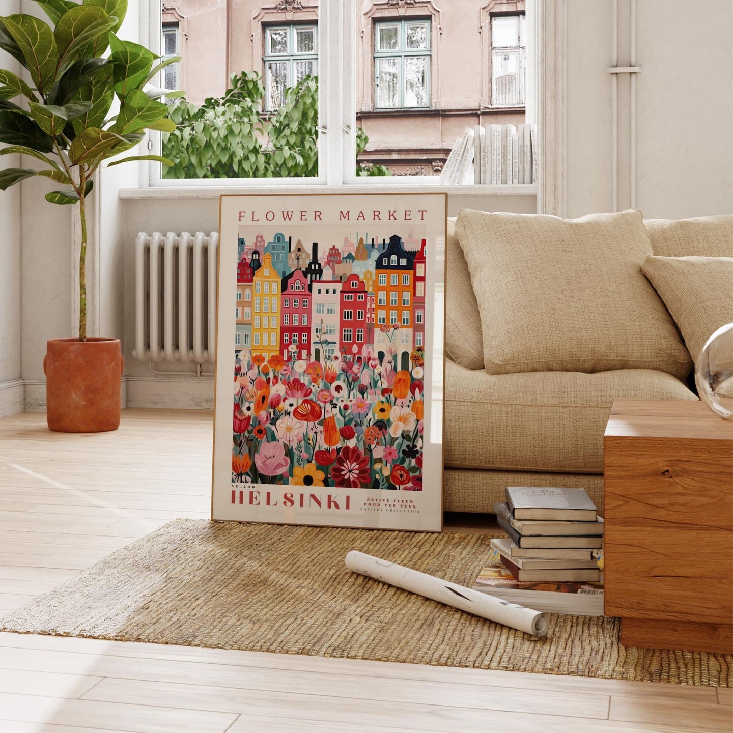 a living room with a couch and a poster on the floor