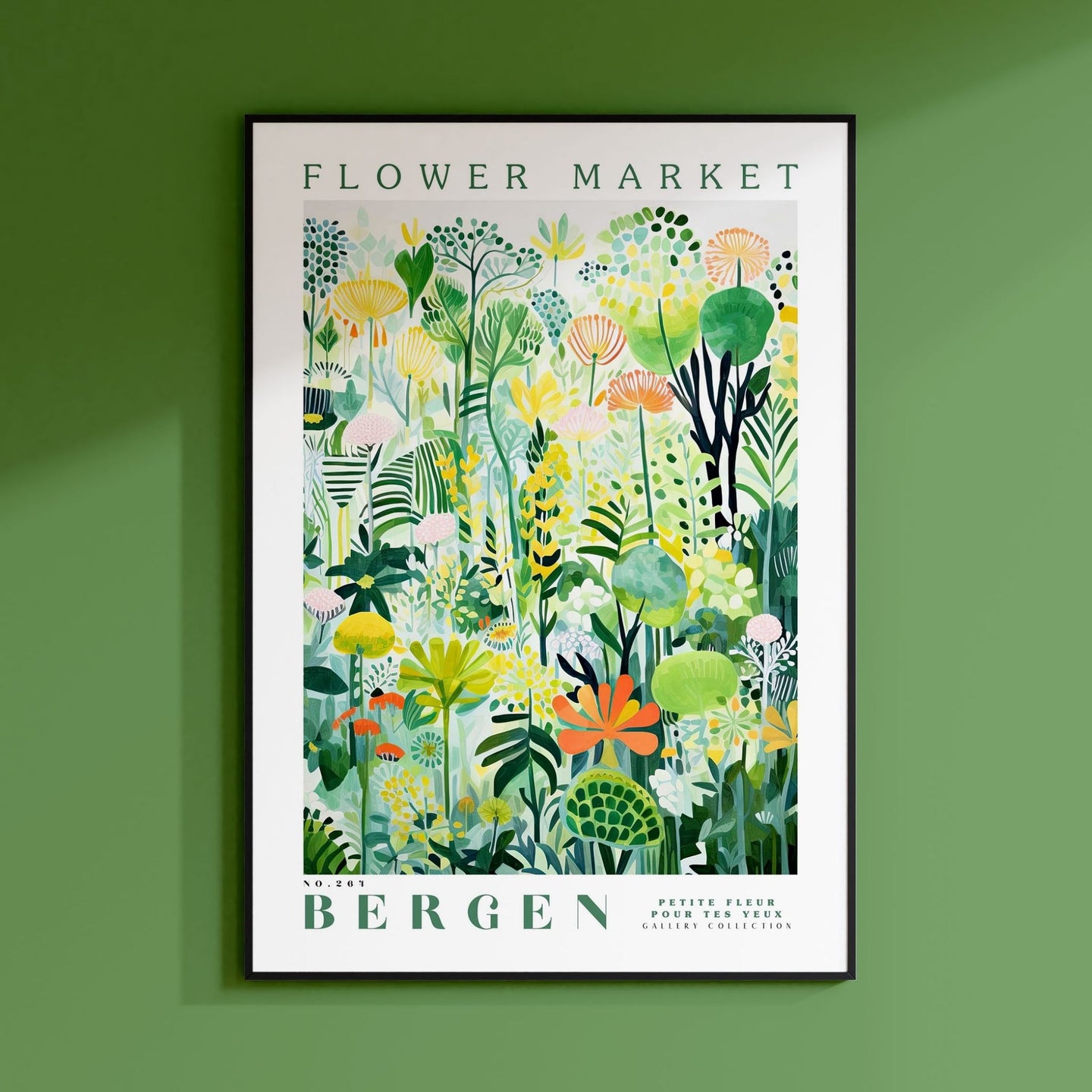 a green wall with a picture of flowers on it