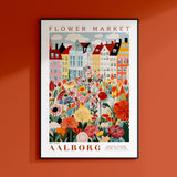a flower market poster hangs on a wall