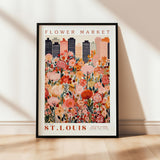 a picture of a flower market poster hanging on a wall