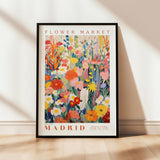 a flower market poster hanging on a wall
