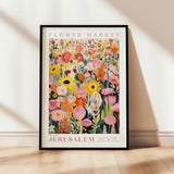 a flower market poster hanging on a wall