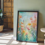 a painting of flowers in a frame on the floor
