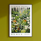 a green wall with a picture of a flower market