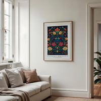 a living room with a couch and a painting on the wall