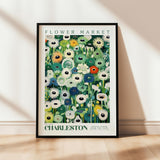 a picture of a flower market poster hanging on a wall