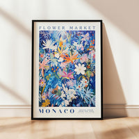 a flower market poster hanging on a wall