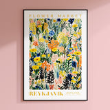 a flower market poster hangs on a pink wall