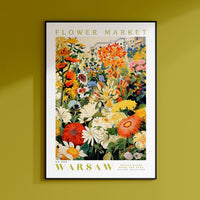 a flower market poster hangs on a wall