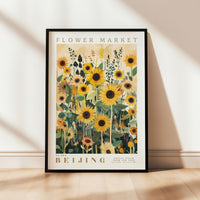 a poster of a field of sunflowers on a wall